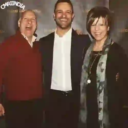 Aaron Costa Ganis with Parents